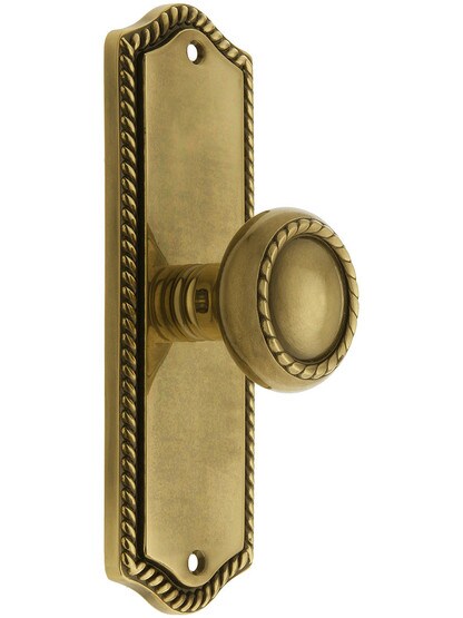 Colonial Revival Rope Design Door Set With Matching Rope Knobs in Antique Brass.